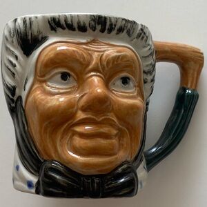 Antique Toby Jug. Old maid hand painted ceramic beer mug
